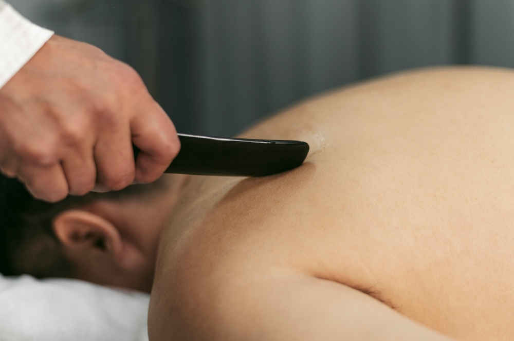 Tissue scraping physical therapy treatment