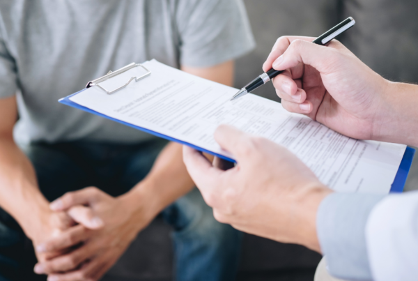 person speaking with a doctor about genital reconstruction surgery