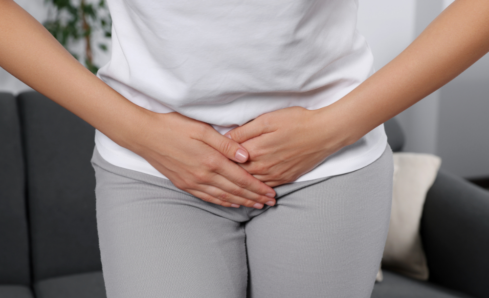 Person experiencing pain from interstitial cystitis